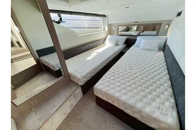  Yacht Photos Pics Interior of 2025 Sessa Marine F47 yacht with twin beds and modern design.
