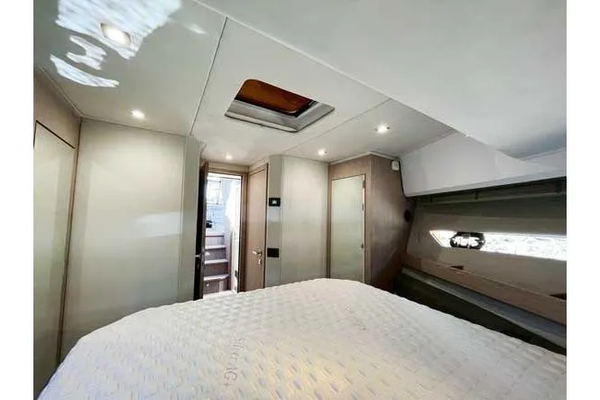  Yacht Photos Pics Luxurious interior cabin of 2025 Sessa Marine F47 yacht, featuring modern design and ambient lighting.
