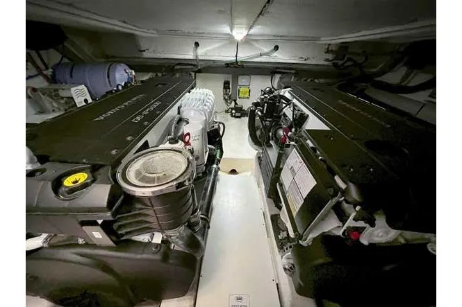  Yacht Photos Pics Engine room of 2025 Sessa Marine F47 yacht, showcasing dual engines and mechanical components.