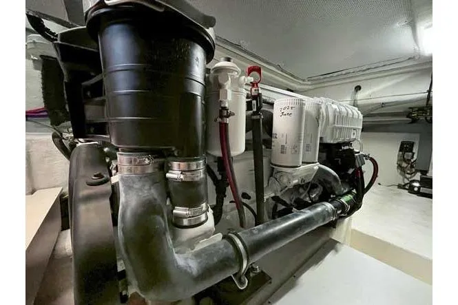  Yacht Photos Pics Engine room of 2025 Sessa Marine F47 yacht, showcasing mechanical components and piping.