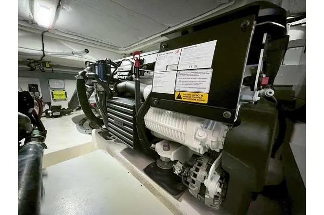  Yacht Photos Pics Engine room of 2025 Sessa Marine F47 yacht, showcasing mechanical components and systems.