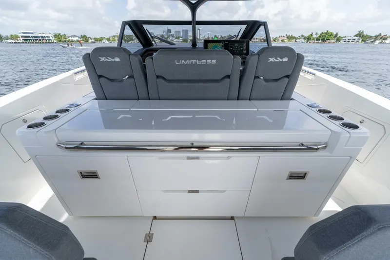  Yacht Photos Pics Luxury Limitless Seas XLV 45 boat interior, featuring sleek seating and modern design, 2025 model.