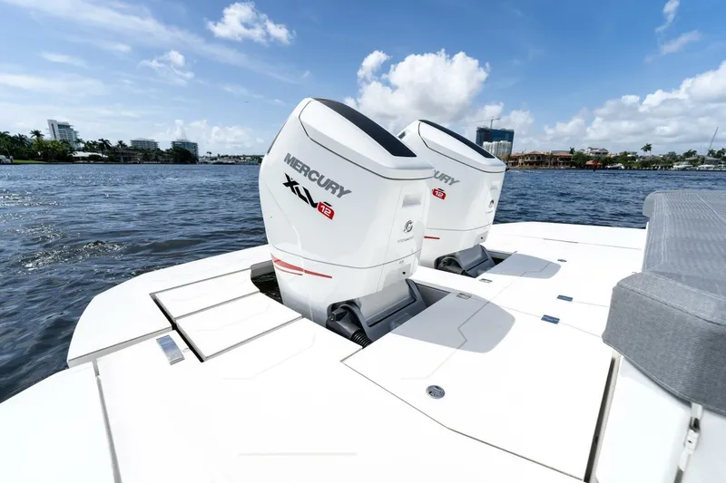  Yacht Photos Pics Twin Mercury outboard engines on Limitless Seas XLV 45 boat, 2025 model, on a sunny day.