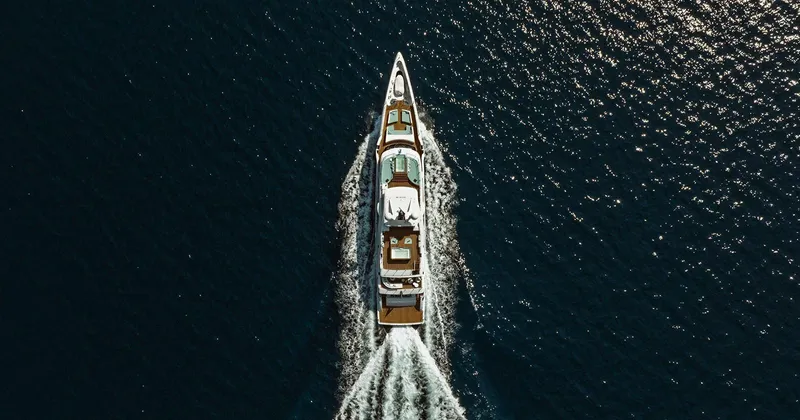  Yacht Photos Pics Aerial view of 2020 Benetti Seagull yacht cruising on open water.