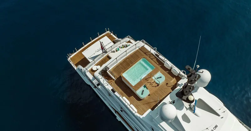  Yacht Photos Pics Aerial view of 2020 Benetti Seagull yacht with deck pool and lounge chairs.