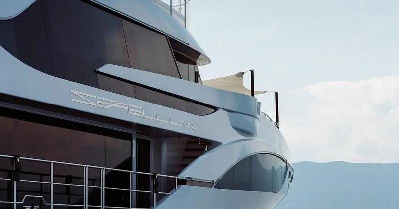  Yacht Photos Pics Luxury Benetti Seagull yacht, 2020 model, sleek design against a serene ocean backdrop.