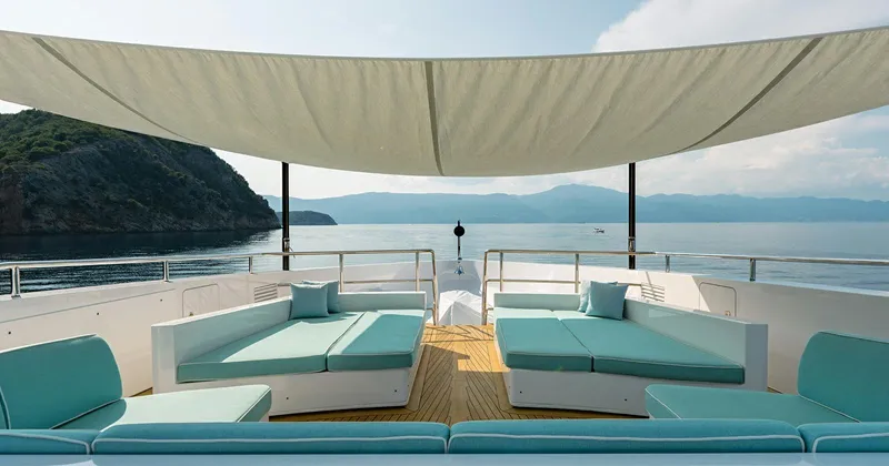  Yacht Photos Pics Luxurious 2020 Benetti Seagull yacht deck with elegant seating and scenic ocean view.