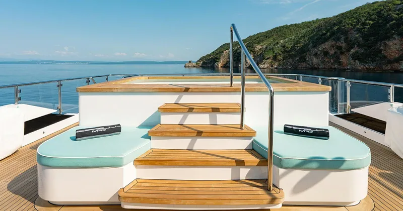  Yacht Photos Pics Luxurious Benetti Seagull yacht deck with jacuzzi, 2020 model, scenic ocean view.