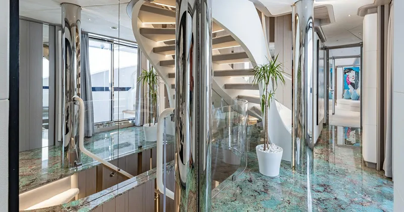  Yacht Photos Pics Luxurious interior of 2020 Benetti Seagull yacht with elegant staircase and modern decor.