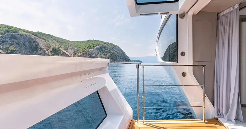  Yacht Photos Pics Luxury yacht Benetti Seagull 2020 cruising near scenic coastal cliffs.