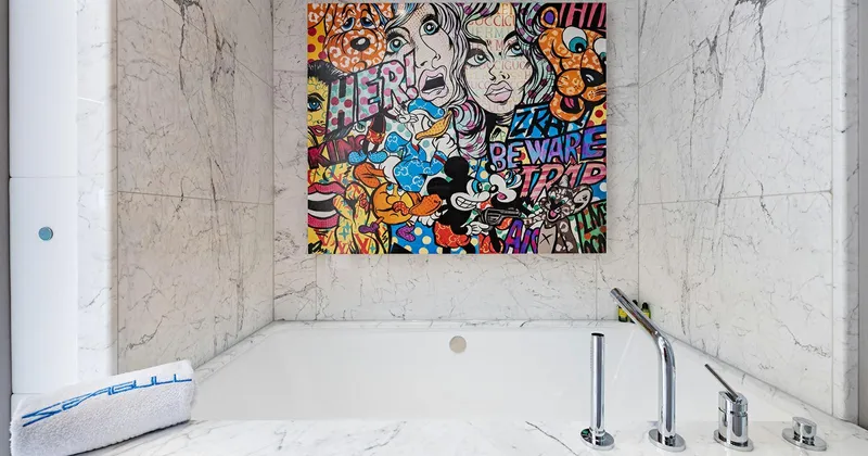  Yacht Photos Pics Luxurious Benetti Seagull 2020 yacht bathroom with vibrant pop art and marble finishes.