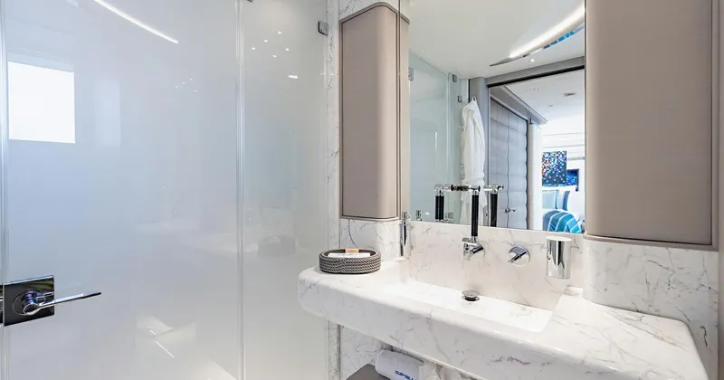  Yacht Photos Pics Luxurious bathroom interior on 2020 Benetti Seagull yacht, featuring elegant marble finishes.