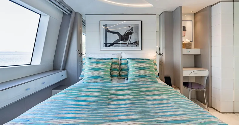  Yacht Photos Pics Luxurious Benetti Seagull 2020 yacht bedroom with modern decor and large window view.