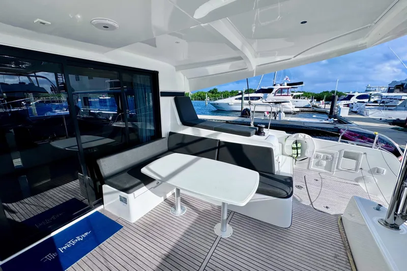  Yacht Photos Pics Charcoal gray cockpit upholstery and teak flooring