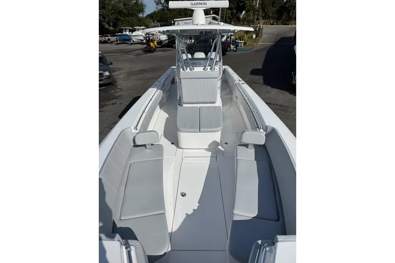  Yacht Photos Pics 2026 Contender 35 ST boat with sleek design and spacious seating.