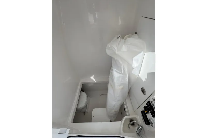  Yacht Photos Pics Interior of 2026 Contender 35 ST boat, featuring compact bathroom amenities.
