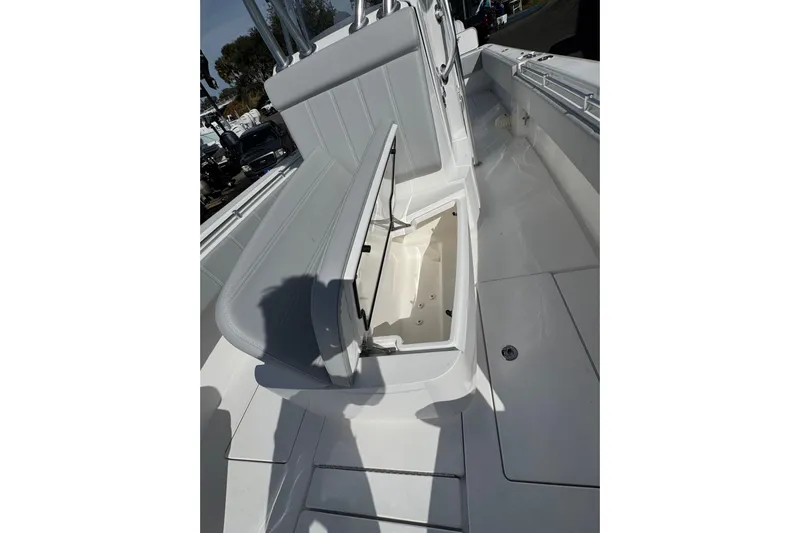  Yacht Photos Pics 2026 Contender 35 ST boat with open storage compartment on deck.