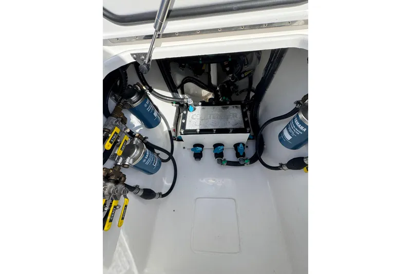  Yacht Photos Pics Contender 35 ST 2026 boat engine compartment with filters and hoses.