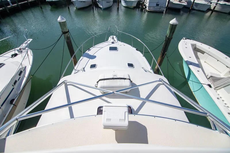 Lilli Ann Yacht Photos Pics 2001 Rampage 38 Express boat docked at marina, aerial view.