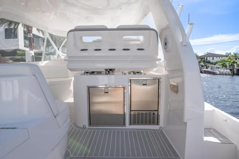 Garbonzo Yacht Photos Pics 2022 Intrepid 477 Evolution yacht interior with modern amenities and sleek design.