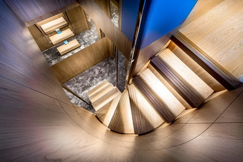  Yacht Photos Pics Luxurious wooden staircase inside 2020 Ferretti Yachts 960, showcasing elegant design and craftsmanship.