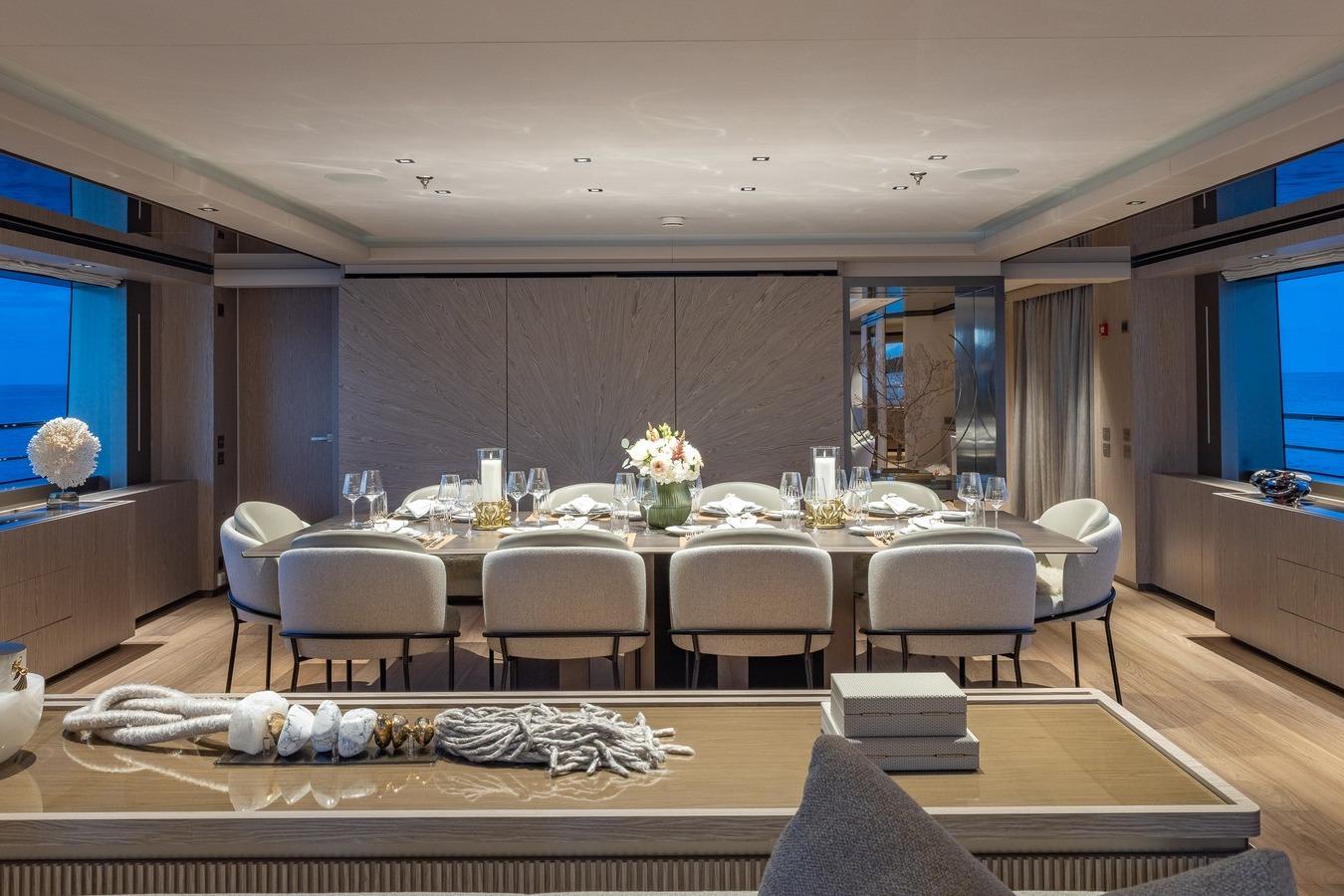 Luxurious dining area on 2024 Codecasa 43 yacht, featuring elegant table setting and modern decor.