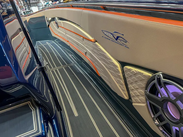 Thunder Struck Yacht Photos Pics 2024 MTI V42 boat interior with sleek design, luxury seating, and modern speaker system.