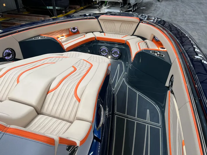 Thunder Struck Yacht Photos Pics Luxurious 2024 MTI V42 boat interior with elegant seating and modern design.