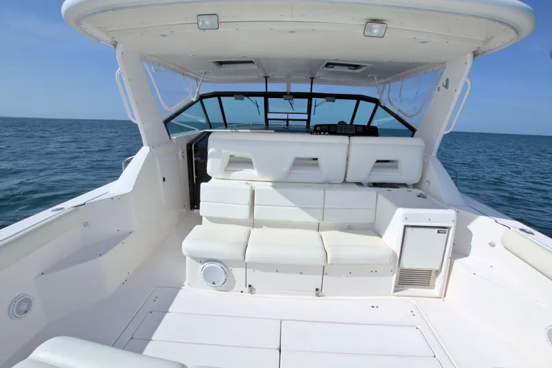 Ohana Yacht Photos Pics 2003 Tiara Yachts 4000 Express interior, featuring spacious white seating and open sea view.