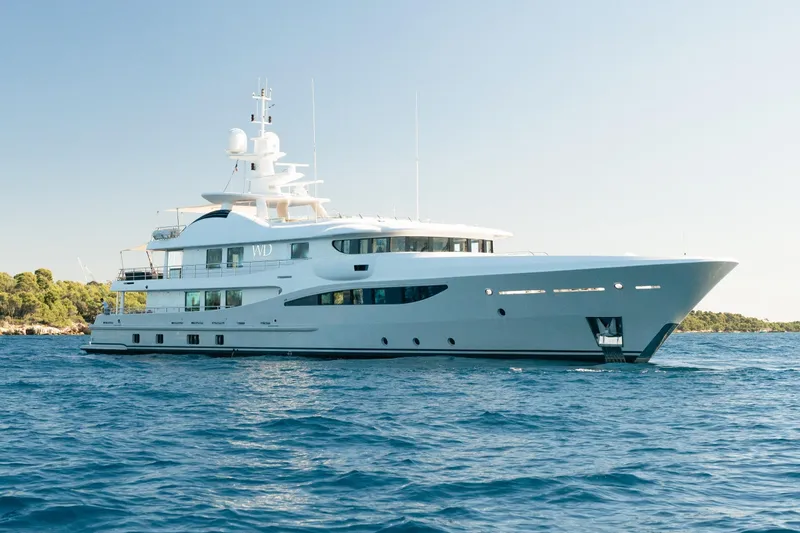 Were Dreams Yacht Photos Pics Luxurious 2008 Amels 171 Limited Edition yacht cruising on serene blue waters.