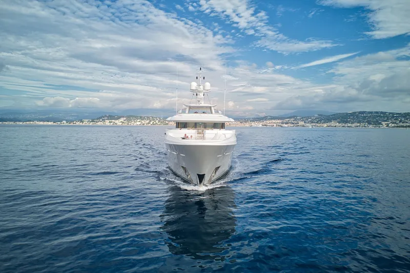 Were Dreams Yacht Photos Pics Luxurious 2008 Amels 171 Limited Edition yacht cruising on calm blue waters.