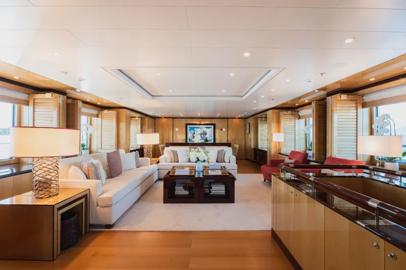 Were Dreams Yacht Photos Pics Luxurious interior of 2008 Amels 171 Limited Edition yacht, featuring elegant seating and decor.