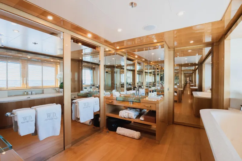 Were Dreams Yacht Photos Pics Luxurious bathroom interior on 2008 Amels 171 Limited Edition yacht, featuring elegant wood finishes.