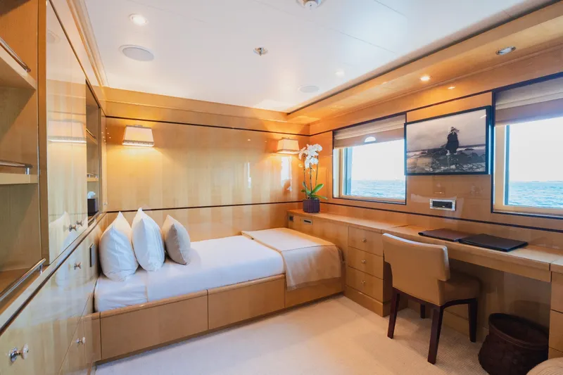 Were Dreams Yacht Photos Pics Luxurious cabin interior of 2008 Amels 171 Limited Edition yacht with elegant wood finishes.