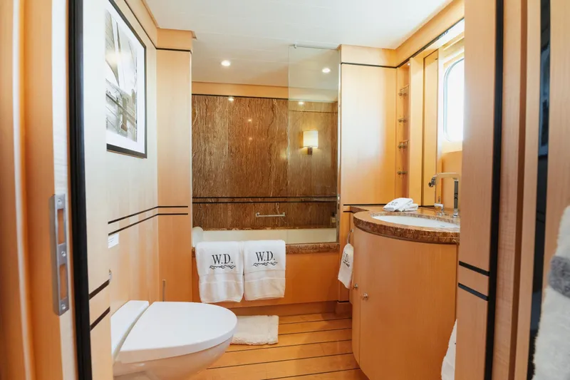 Were Dreams Yacht Photos Pics Luxurious bathroom on 2008 Amels 171 Limited Edition yacht with elegant wood finishes.