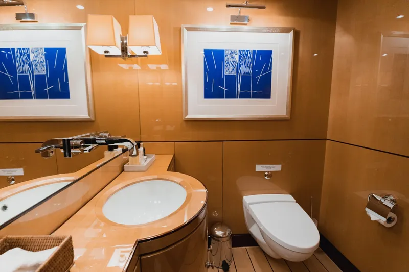 Were Dreams Yacht Photos Pics Luxurious bathroom on 2008 Amels 171 Limited Edition yacht with modern fixtures and elegant decor.