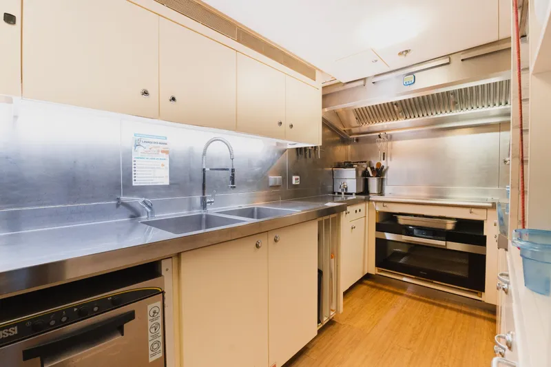 Were Dreams Yacht Photos Pics Modern kitchen in 2008 Amels 171 Limited Edition yacht with stainless steel appliances.