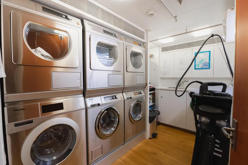 Were Dreams Yacht Photos Pics Laundry room with Miele appliances on Amels 171 Limited Edition yacht, 2008 model.