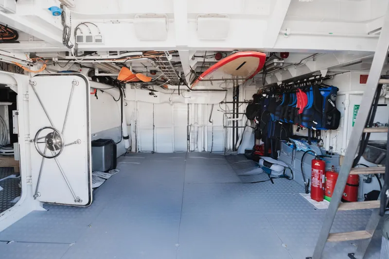 Were Dreams Yacht Photos Pics Interior of 2008 Amels 171 yacht with equipment storage and safety gear.