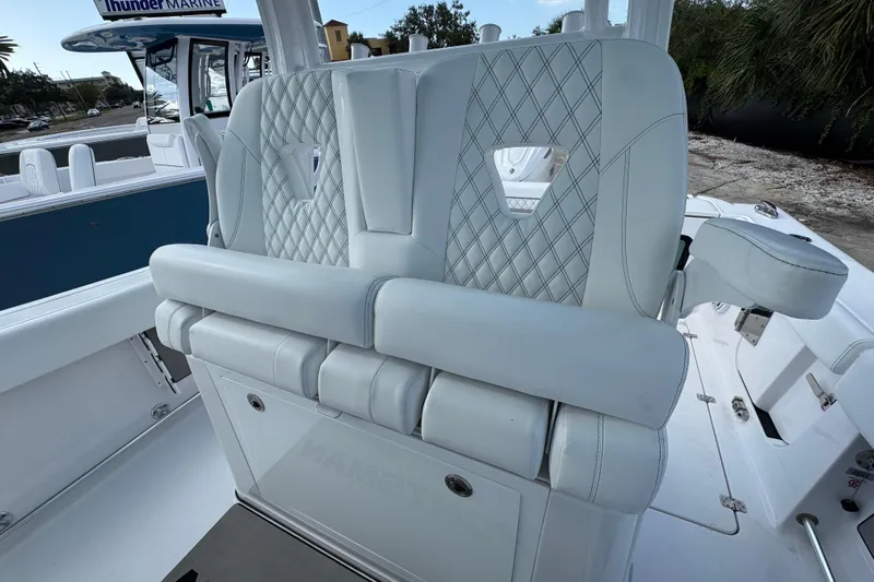 Yacht Photos Pics 2025 Sportsman Open 302 Center Console with luxurious seating and diamond stitching.