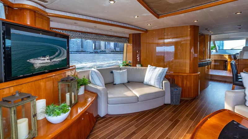 Iconic Yacht Photos Pics Luxurious interior of 2003 Sunseeker 82 Yacht with elegant wood finishes and modern decor.