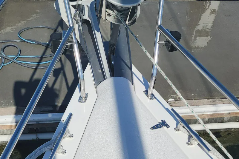 Janice Marie Yacht Photos Pics Bow of 2004 Catalina 350 Sloop with stainless steel railings and anchor setup.