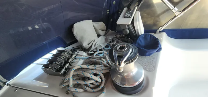 Janice Marie Yacht Photos Pics Sailing equipment on a 2004 Catalina 350 Sloop, featuring ropes and a winch.