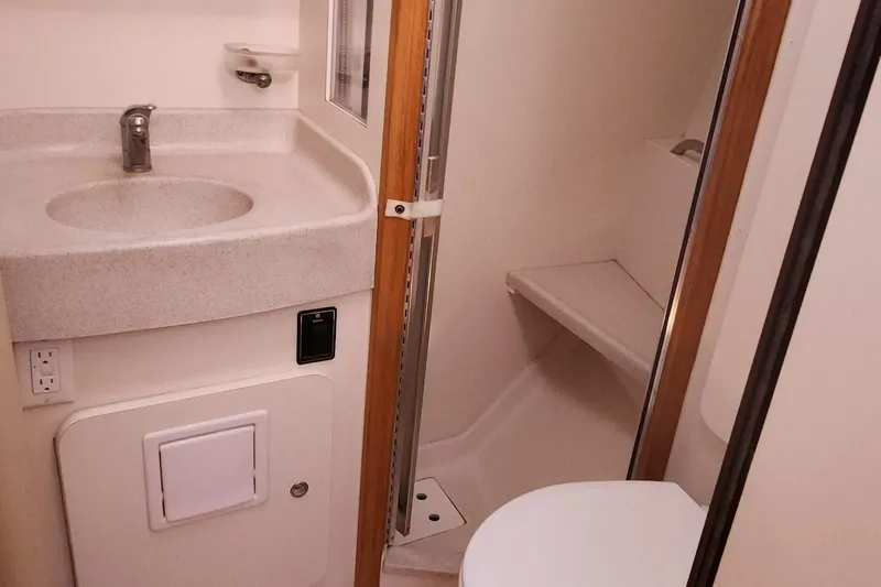 Janice Marie Yacht Photos Pics 2004 Catalina 350 Sloop bathroom with sink, shower, and toilet.