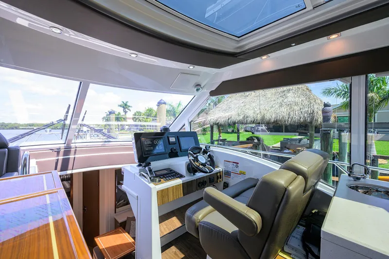 Ajac Cruiser Yacht Photos Pics 2015 Cruisers Cantius yacht helm with modern controls and panoramic windows.