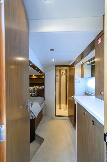 Ajac Cruiser Yacht Photos Pics 2015 Cruisers Cantius yacht interior with modern wood finish and cozy sleeping area.