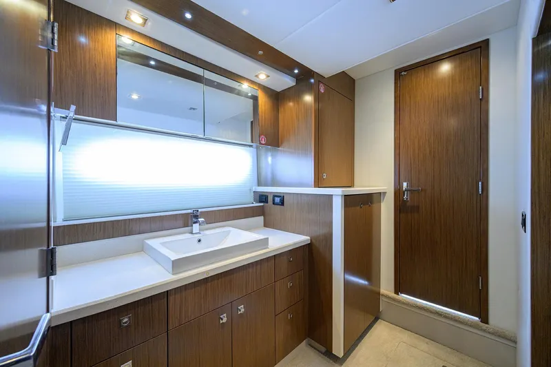 Ajac Cruiser Yacht Photos Pics Luxurious 2015 Cruisers Cantius yacht bathroom with modern wood cabinetry and sleek fixtures.