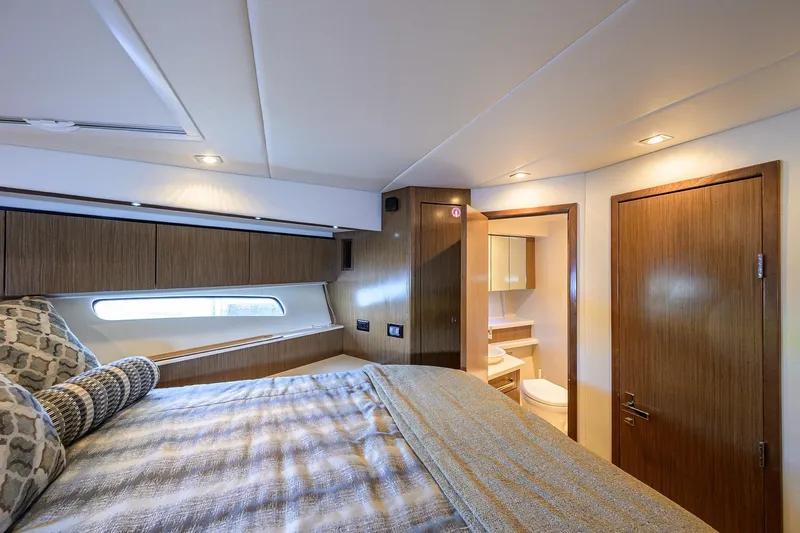 Ajac Cruiser Yacht Photos Pics Luxurious 2015 Cruisers Cantius yacht bedroom with ensuite bathroom and modern decor.