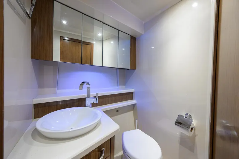 Ajac Cruiser Yacht Photos Pics Luxurious bathroom in 2015 Cruisers Cantius yacht with modern fixtures and elegant design.