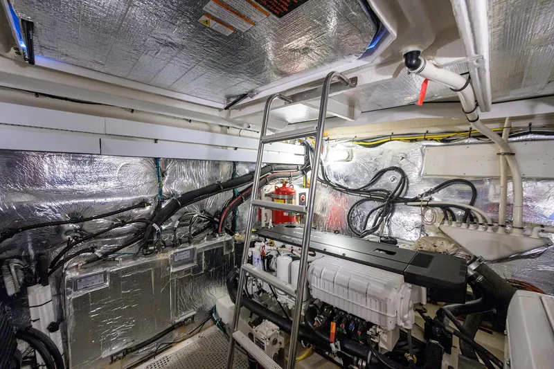 Ajac Cruiser Yacht Photos Pics Engine room of 2015 Cruisers Cantius yacht with ladder and machinery.